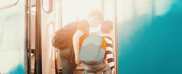 students board a bus