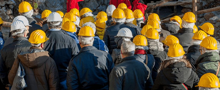 workers in hard hats during an evacuation drill